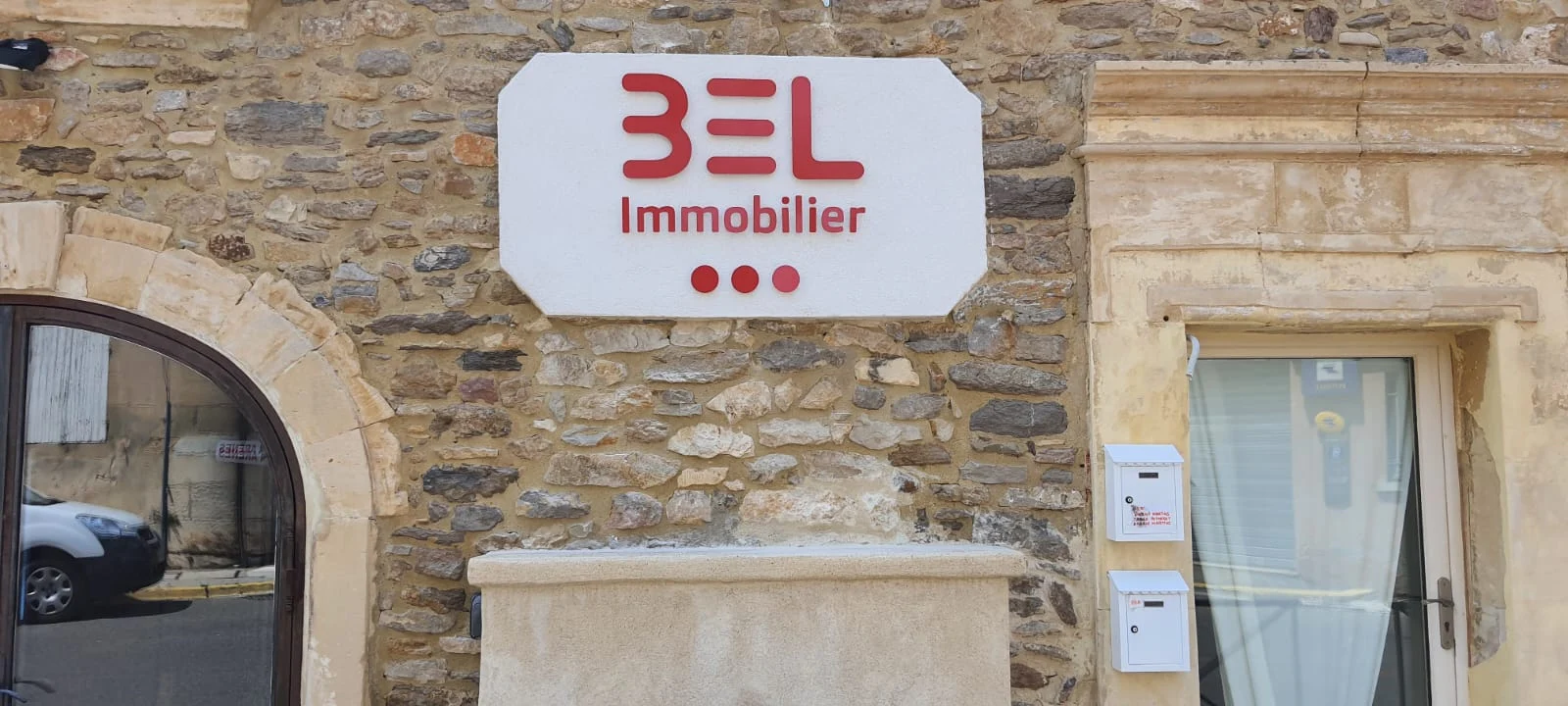 enseigne pour agence immobilière Paris