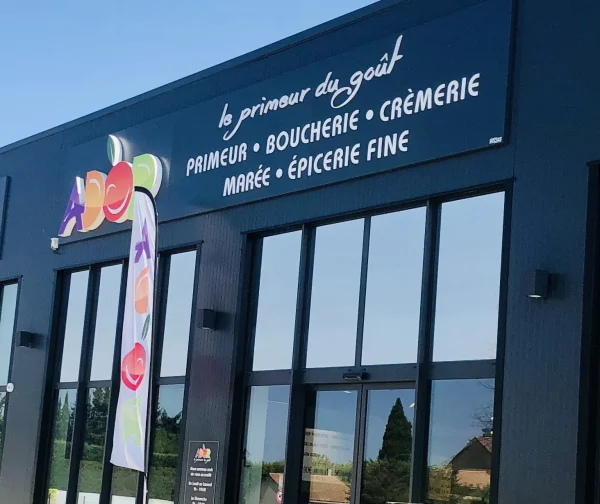 Bandeau noir Le Primeur du Goût avec lettres blanches et logo fruits coloré