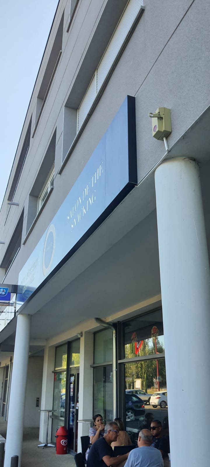 Microperfore vitrine panneau alu boulangerie caissson